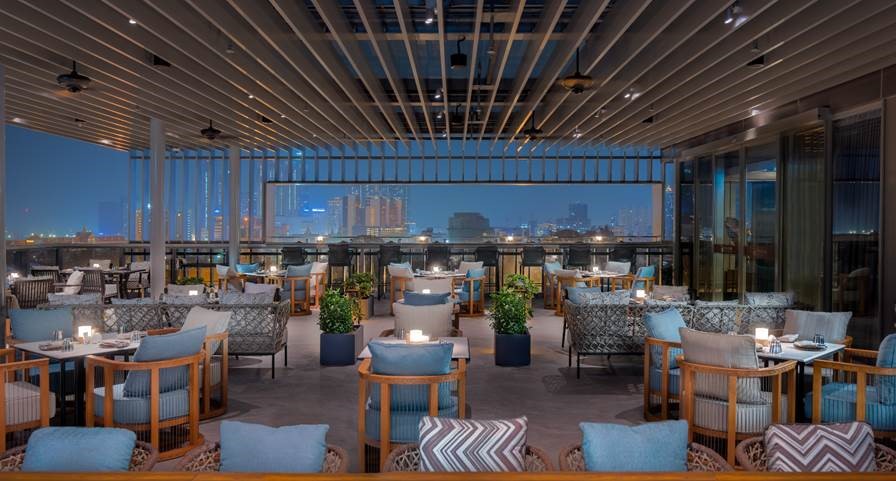 FiveFive Rooftop Restaurant & Bar is the signature dining venue at Hyatt Regency Phnom Penh