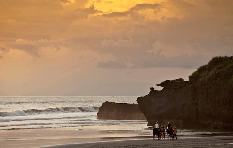 Soori Bali overlooks a stunning stretch of black diamond sand volcanic beach.