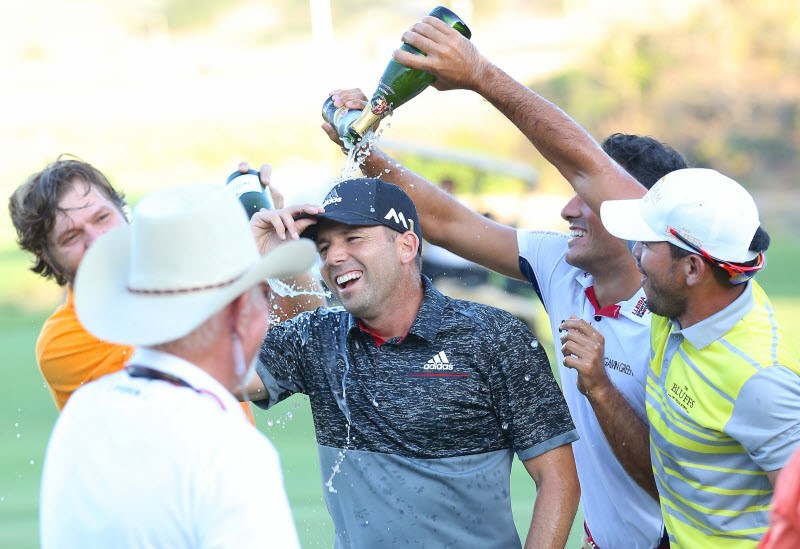 Golf star Sergio Garcia gets showered with champagne after winning the 2015 Ho Tram Open