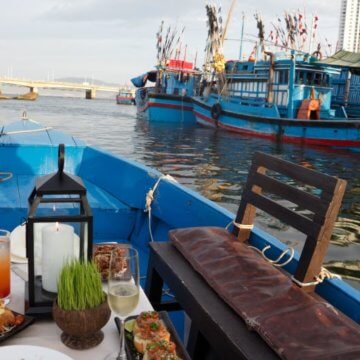 The cruise caters to up to eight passengers aboard a traditional wooden Vietnamese fishing boat.