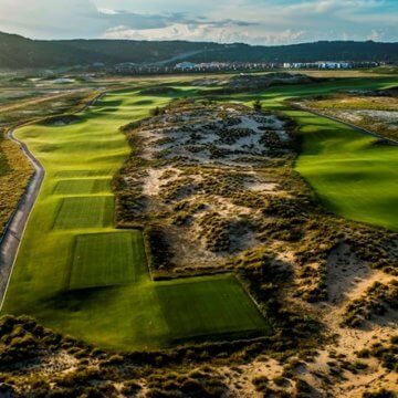The Links course at Cam Ranh unfolds over spectacular rolling topography