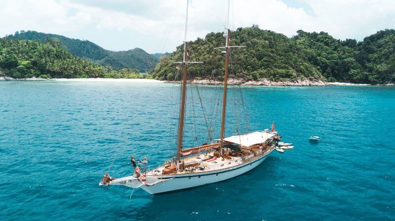 The 30m gaff-rigged schooner SY Dallinghoo anchors in the Mergui Archipelago.