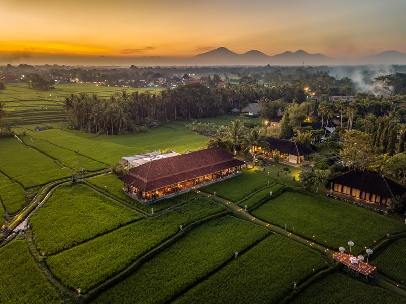 An aerial view of Tanah Gajah, a resort by Hadiprana showing the Tempayan restaurant amid the rice paddies