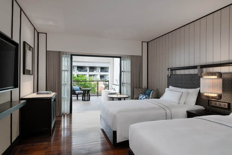 The Deluxe Rooms feature a standalone bathtub on a private balcony.