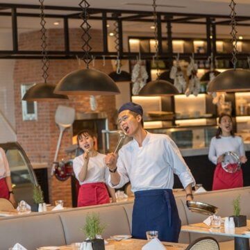 With ladles, pans and tambourines in hand, and with a live piano as a foundation, the apron-and-toque donning Alma Choir break into song and dance as suddenly as a flash mob to perform international and Vietnamese tunes at La Casa restaurant on Wednesday and Friday evenings.