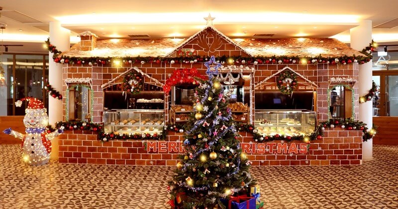 Measuring 7.13m in length, 3.2m high and 3m wide, the life-size gingerbread house is made of 277kg of gingerbread – comprising 950 gingerbread wall tiles and 1500 gingerbread roof tiles  - and festooned with 30kg of meringue, Christmas decorations and lights. 