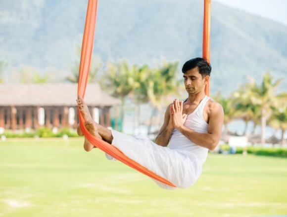 Also dubbed anti-gravity yoga, the resort’s aerial yoga swaps a yoga mat on the floor for a silk hammock suspended from outdoor support beams, permitting participants to practice postures without compressing the spine or applying pressure to joints including the wrists.
