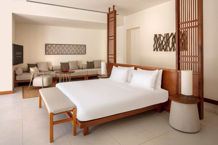 Guest rooms evoke a stylish aesthetic defined by elegance and clean minimalism.