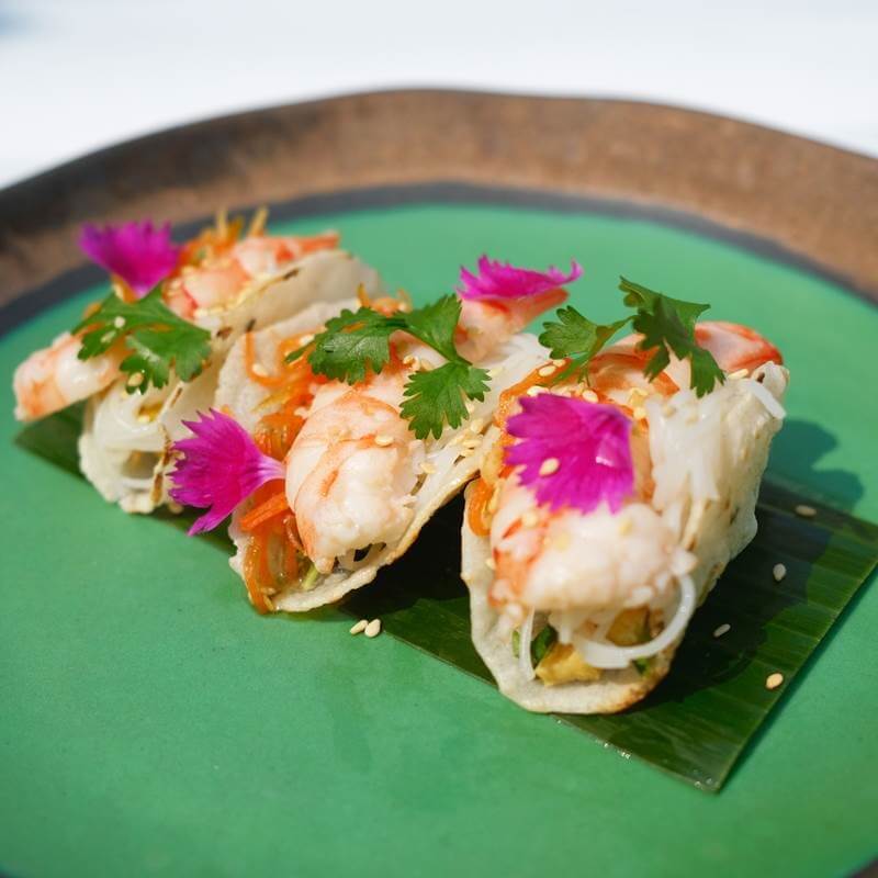 ‘Khao Khaab Hor Goong’ is chilled prawn salad wrapped in sesame rice paper, with piquillo peppers, fried tofu, fermented rice noodles and fresh Vietnamese mint