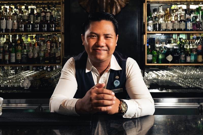 Mr Kong Len, bar captain at the Elephant Bar, Raffles Hotel Le Royal, Phnom Penh, Cambodia