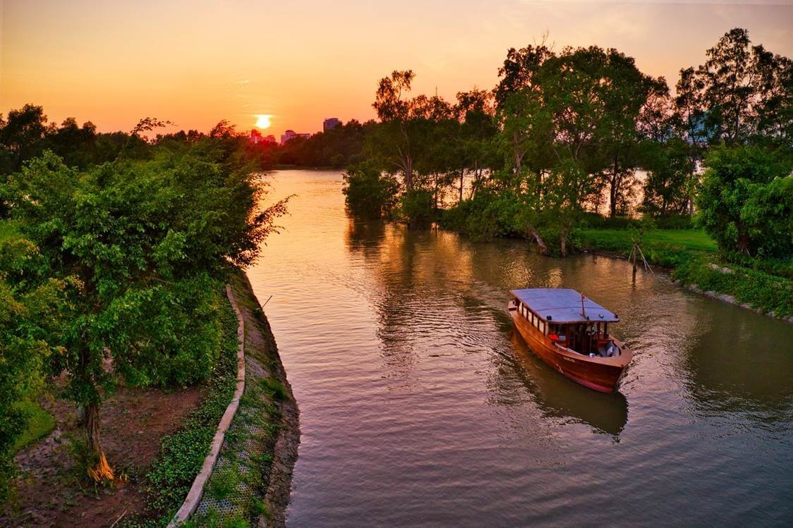 Take a sunset cruise in the Mekong Delta at Azerai Can Tho