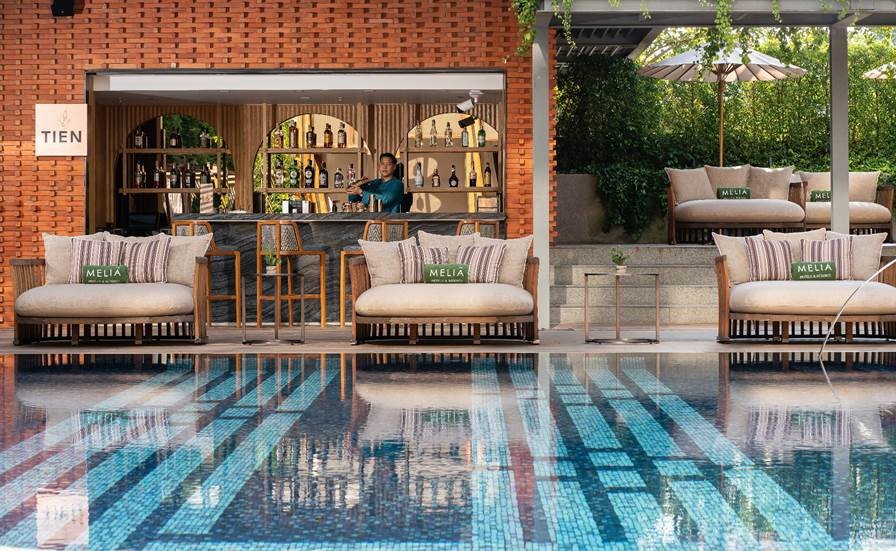 With a 28-seat capacity, Tien Pool Bar’s stools, outdoor sofas and sunbeds make the most of the hotel’s outdoor pool with striking tiling that makes for a contemporary interpretation of textile patterns the locals call “teen jok”.