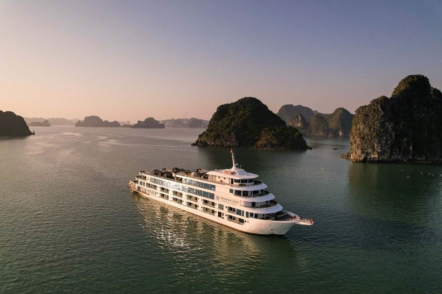 The Ambassador Cruise II's daytime voyage, known as ‘Ambassador Day Cruise’, takes passengers on a sublime journey through the UNESCO World Heritage site, renowned for its myriad limestone karsts dotting its emerald waters.