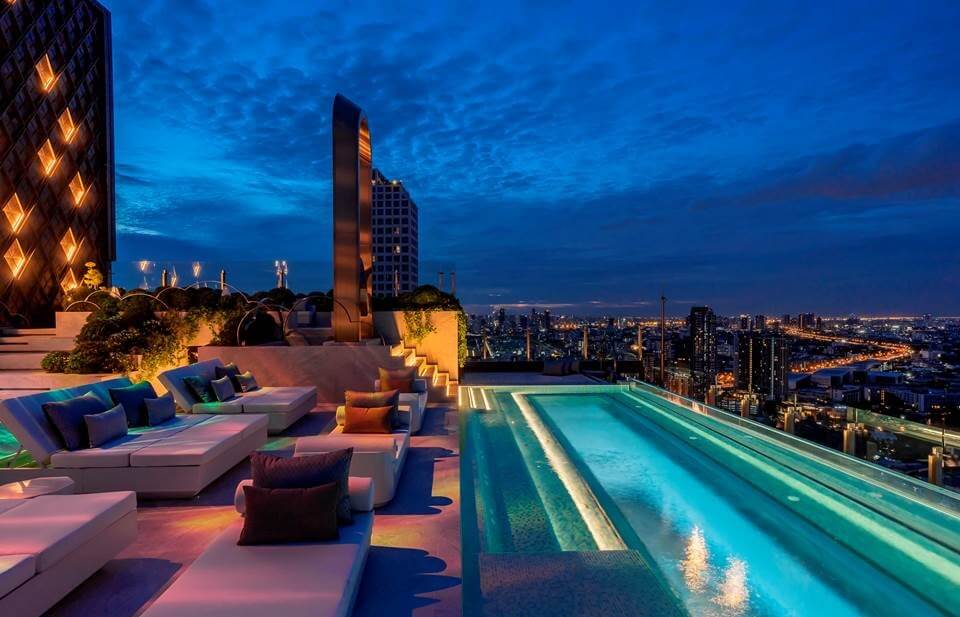 By night the hotel’s 34th floor, featuring a pool bar, transparent infinity pool, and rooftop terrace dotted with outdoor lounges, sunbeds and a compelling contemporary interpretation of Bangkok’s Brahman structure The Giant Swing, all become an upper-floor extension of 33rd floor LUZ Bangkok Tapas Bar.