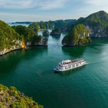 On the second day of the cruise, passengers set sail on the relatively unchartered waters of Lan Ha Bay aboard Ambassador Signature Cruise, offering 39 cabins with a private balcony or terrace, a spacious sundeck, restaurant, piano lounge, bars, spa, and a water slide that takes guests to the bay’s emerald sea.