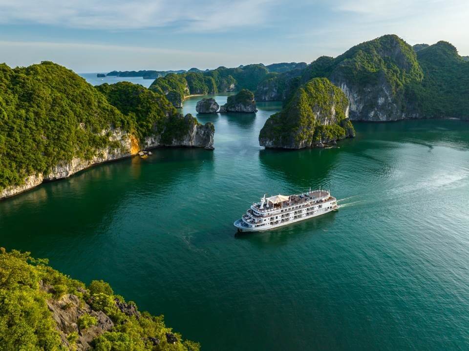 On the second day of the cruise, passengers set sail on the relatively unchartered waters of Lan Ha Bay aboard Ambassador Signature Cruise, offering 39 cabins with a private balcony or terrace, a spacious sundeck, restaurant, piano lounge, bars, spa, and a water slide that takes guests to the bay’s emerald sea.