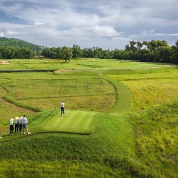 Verdant rice paddies imbue the course with a sense of place