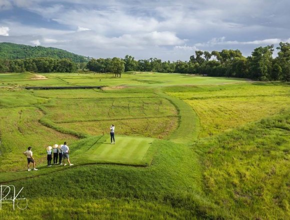 Verdant rice paddies imbue the course with a sense of place