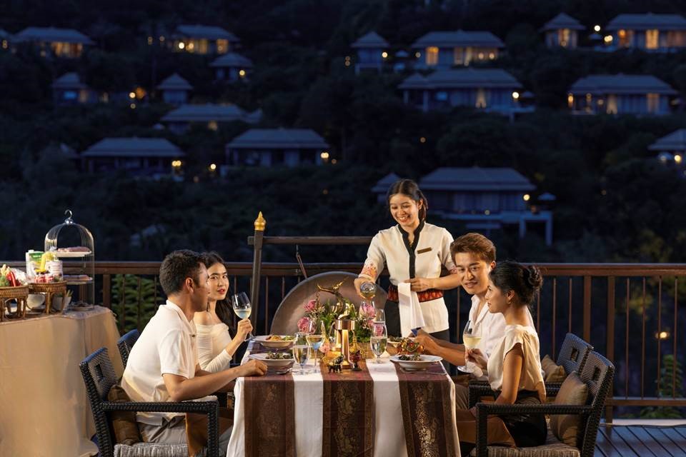 Guests enjoy a Chef’s Table dinner