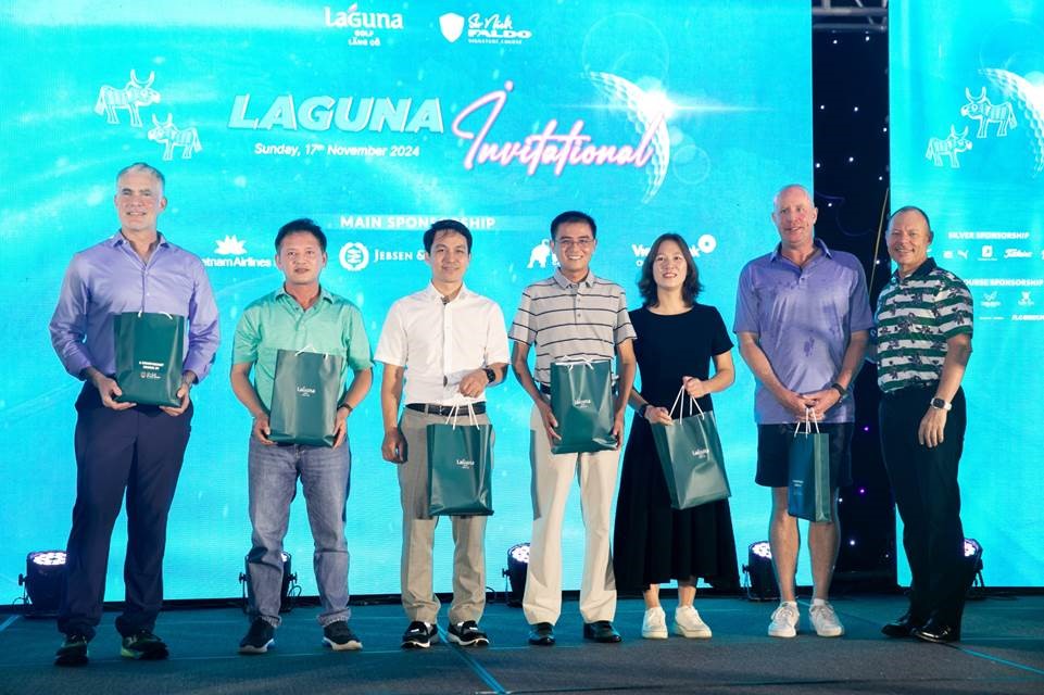 Winners pose with their prizes alongside Gavin Herholdt, Managing Director of Laguna Lang Co, pictured far right