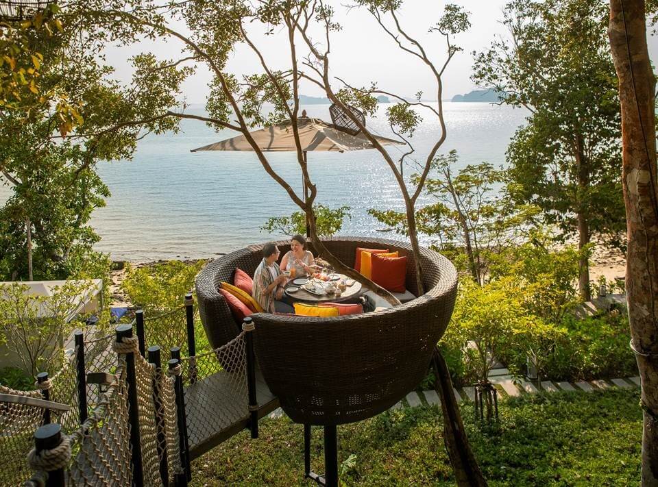 The Bird’s Nest tables sit precariously among the trees, perched high above the resort and overlooking the Andaman Sea