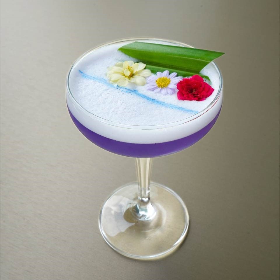 LUZ’s bartenders will concoct ‘Velvet Bloom’ cocktails, featuring gin, Bianco Vermouth, homemade pandan chamomile cordial, butterfly pea juice, and egg white, during PRIDAY as well as for the entirety of June.
