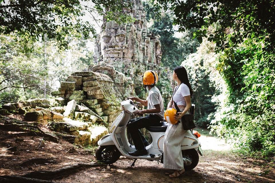 Raffles Grand Hotel d’Angkor’s 'Lost Civilisations of Angkor by Vespa' tour