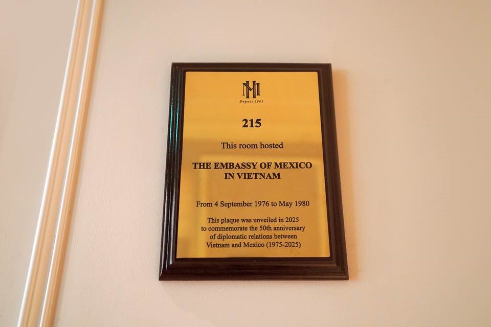 The plaque is mounted outside Room 215 at Sofitel Legend Metropole Hanoi, which hosted the Embassy of Mexico in Vietnam from 1976 to 1980